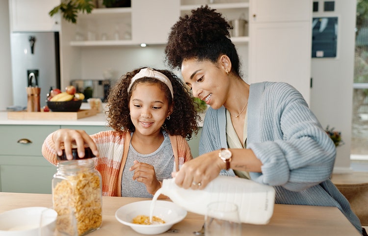 Little girl eating cereal